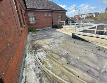 Flat roof repaired dungannon before 1